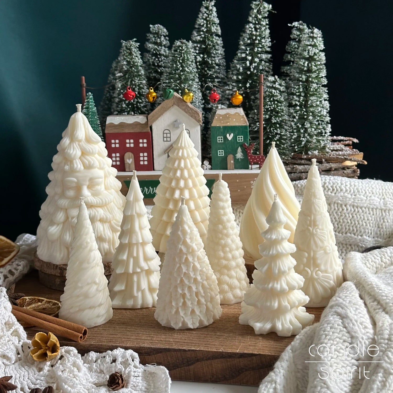 Nine scented Christmas tree candles on a background with Christmas decorations - seasonal home decor and holiday host gift