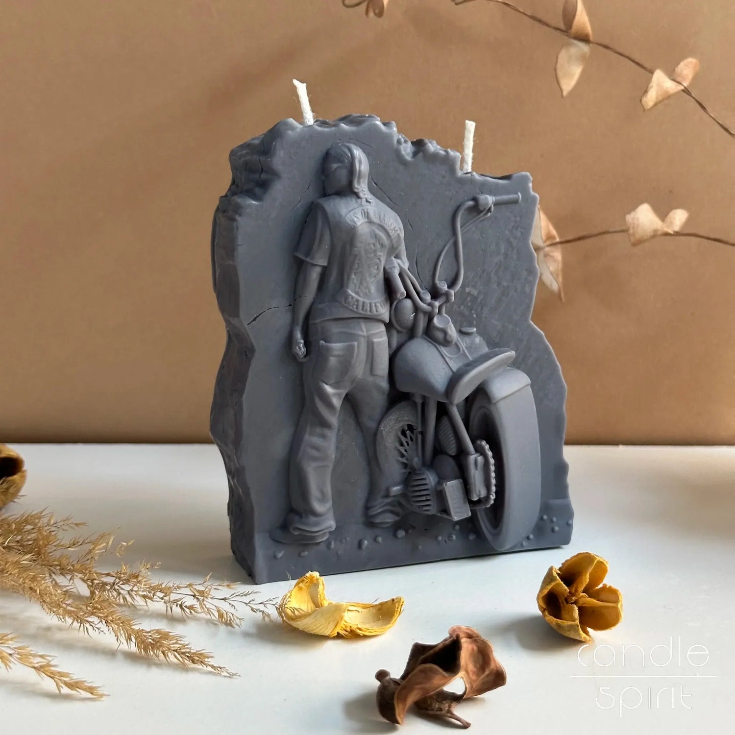 Scented gray biker candle with a motorcycle on a beige background - birthday gift for a boyfriend
