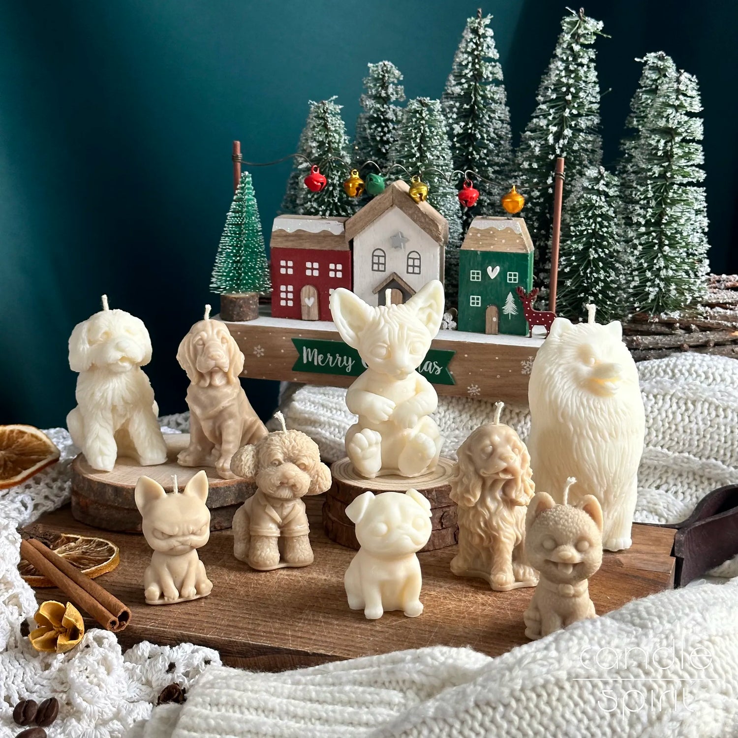 Scented white and beige cats and dogs candles of different breeds on a Christmas background - unique baby shower and wedding favors