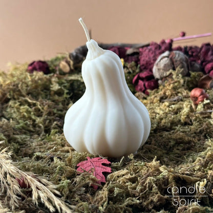 Fall scented white pumpkin candle on a bed of moss - unique autumn wedding favors. Thanksgiving decor, and perfect seasonal gift. 