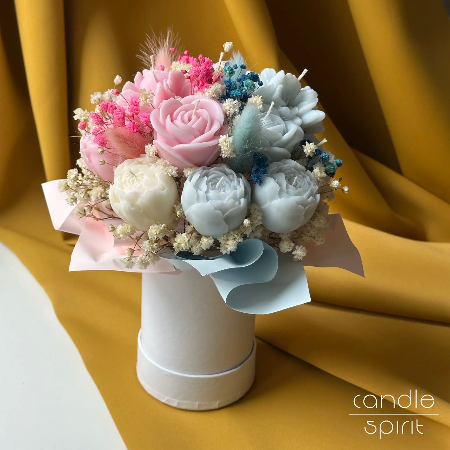 Pink and blue bouquet of candles with flowers and baby's breath - unique baby shower gift. Gender reveal party decor