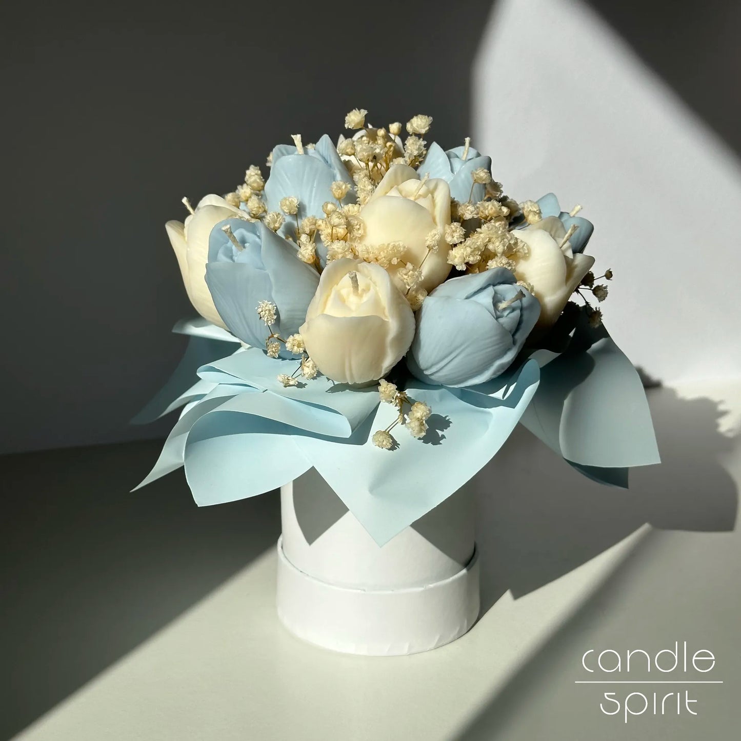 Flower bouquet of blue and white tulip candles in a white box - something blue for a wedding, Easter decor.