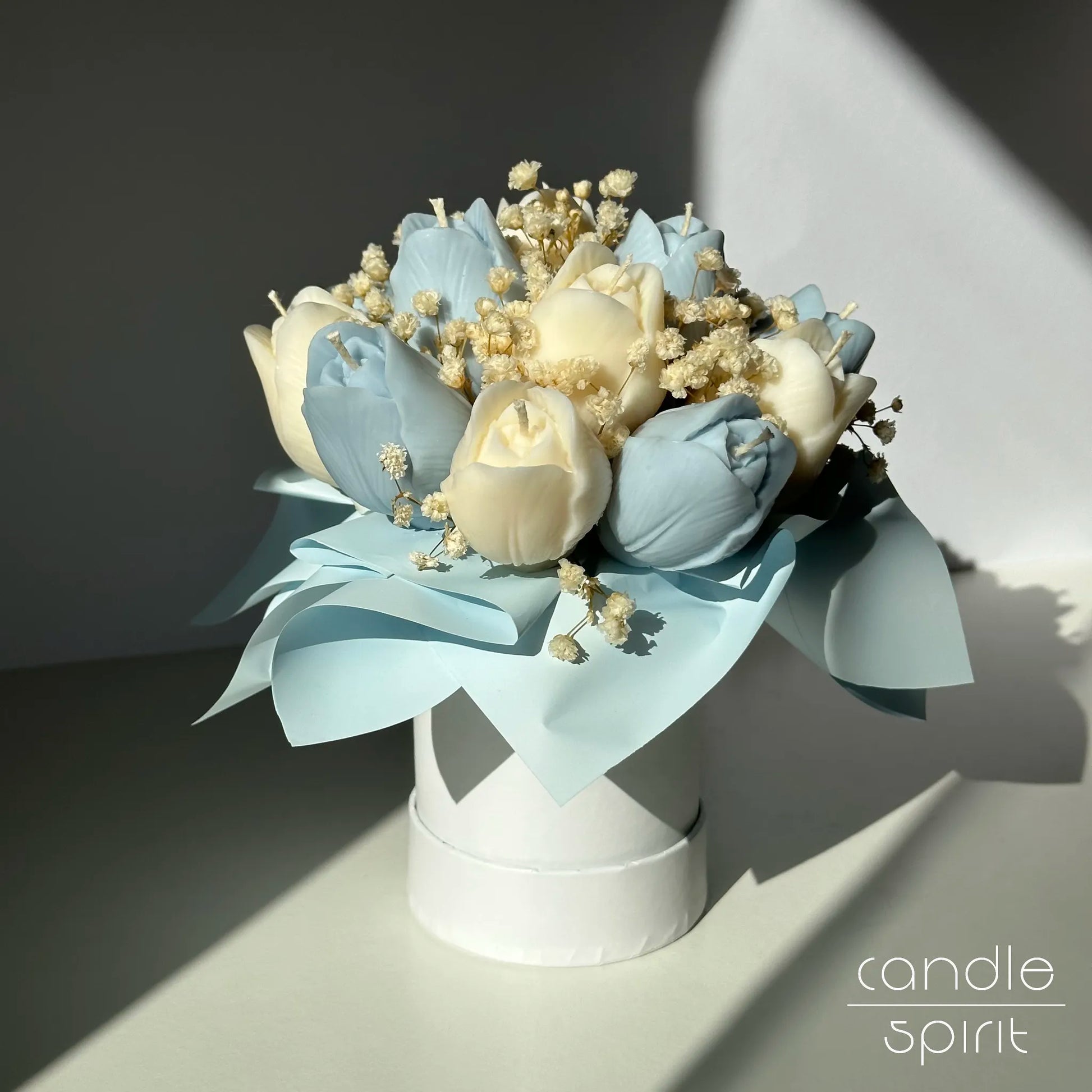 Flower bouquet of blue and white tulip candles in a white box - something blue for a wedding, Easter decor.