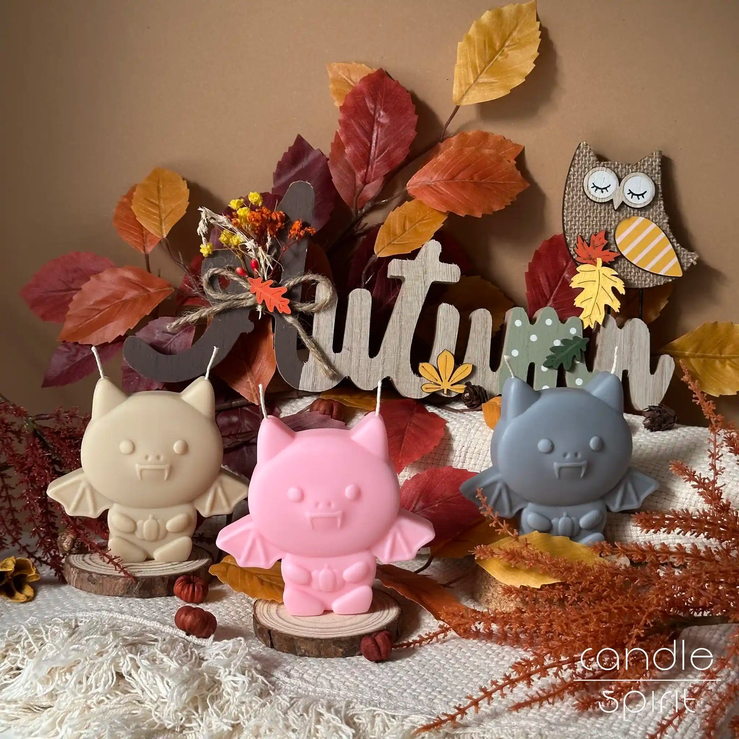 Three cute bat candles on autumn decorations - Halloween decor and unique fall gift for kids, best friends.