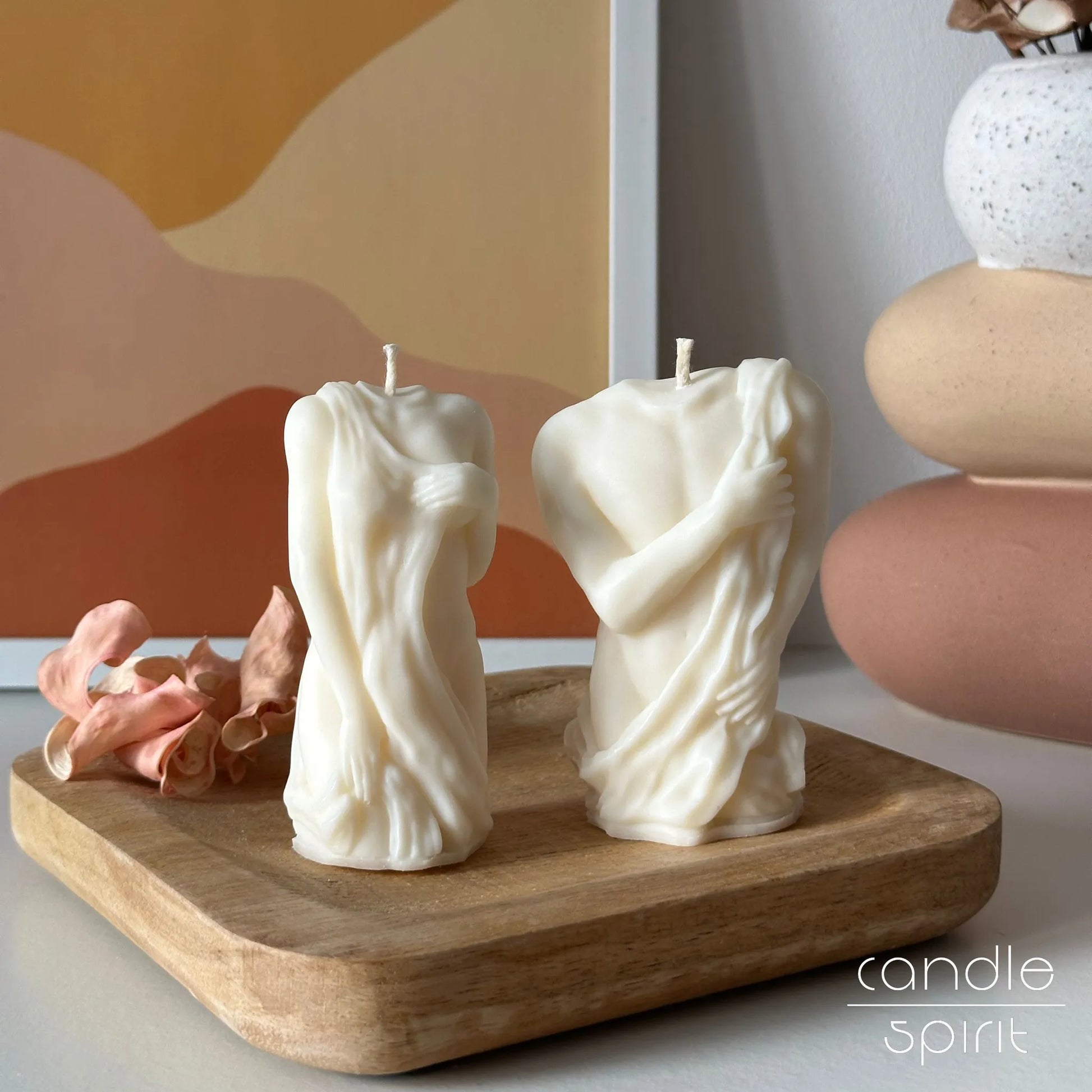 Two greek torso candles of a man and a woman inspired by ancient Rome and Greece - vintage home decor.