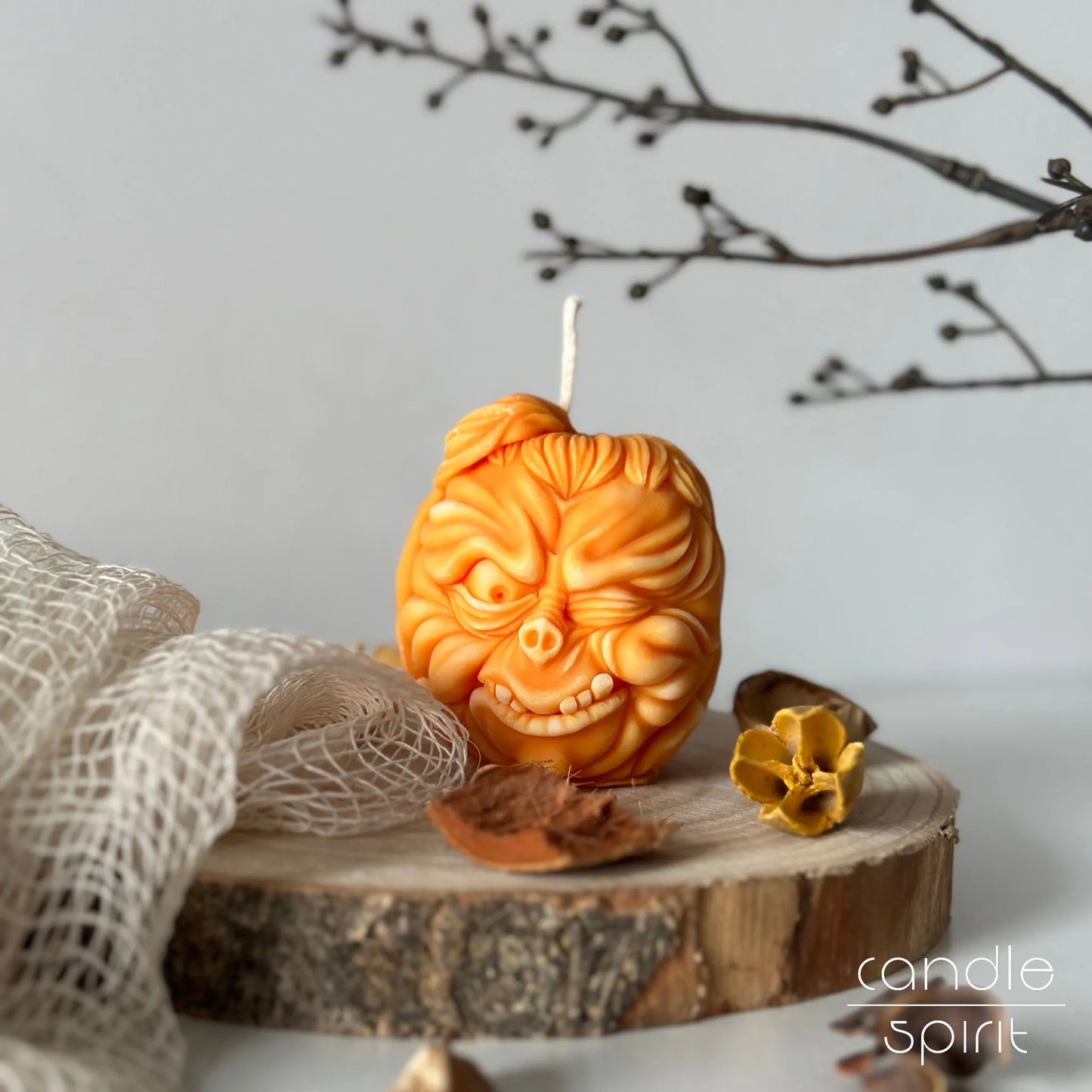 Large Halloween pumpkin candle with a spooky face design - Halloween gifts for kids, friends, coworkers, hosts.