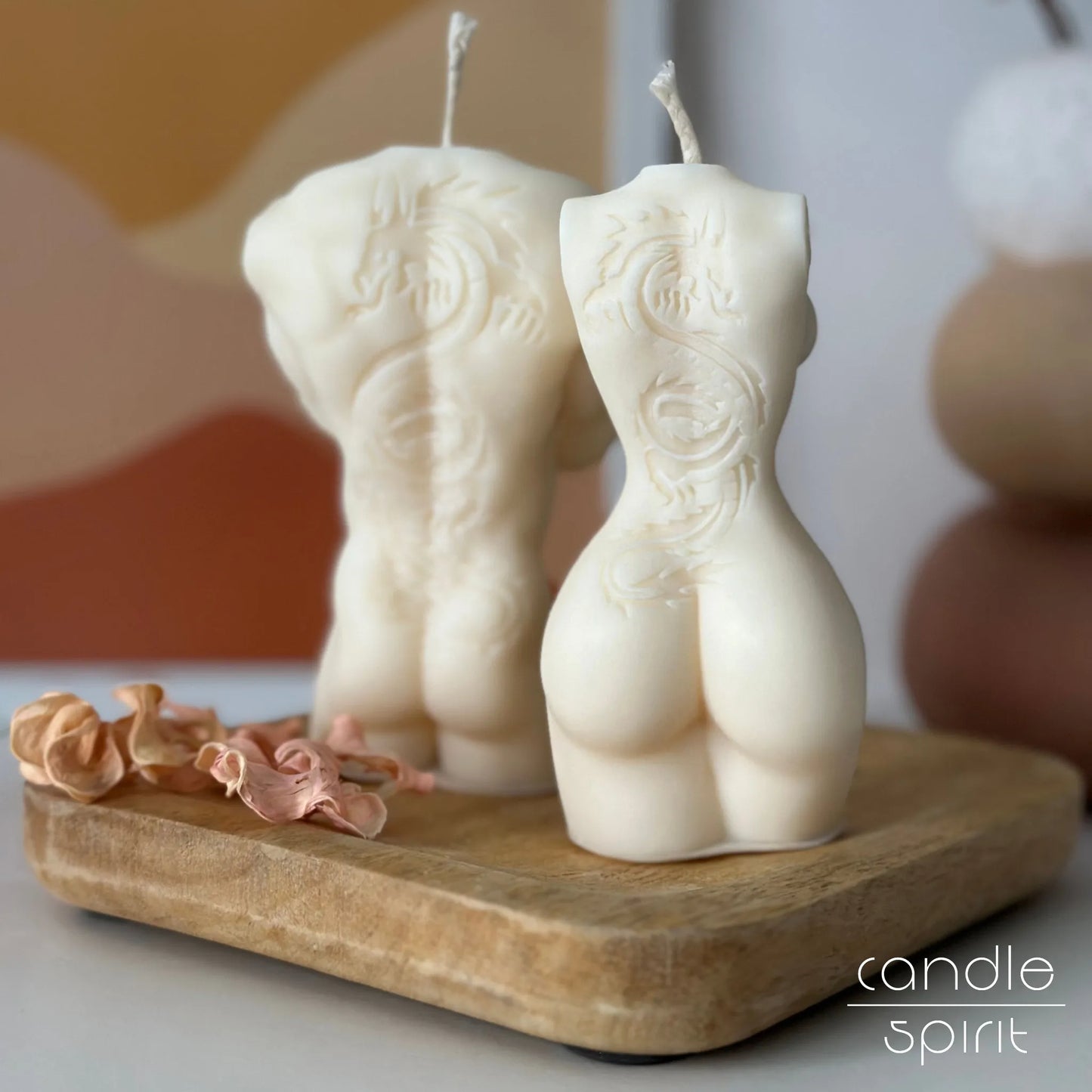 White man and woman body candles with the dragon tattoos - tattoo lover gift. Unique tattoo shop, beauty salon, gym, and home decor. 