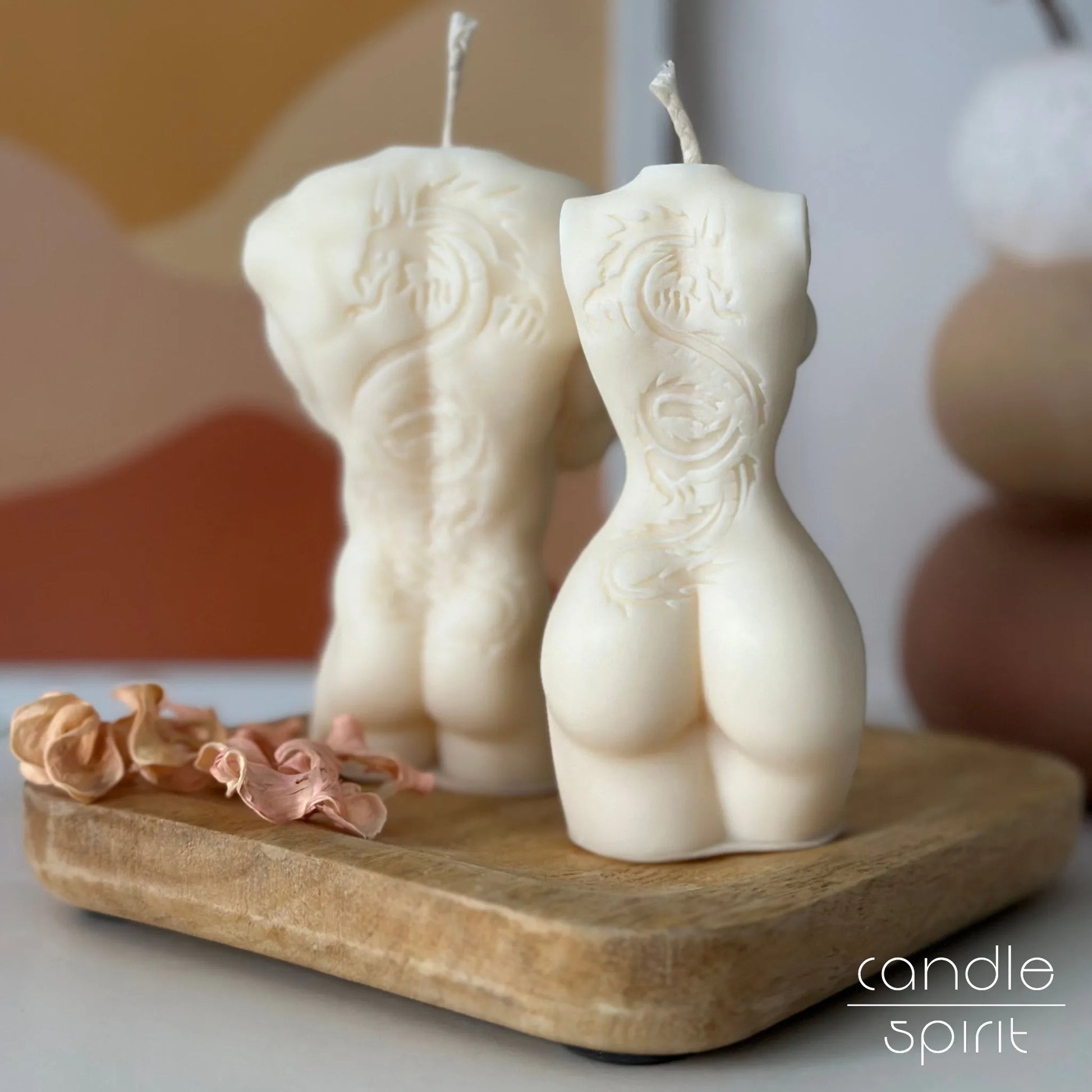 White man and woman body candles with the dragon tattoos - tattoo lover gift. Unique tattoo shop, beauty salon, gym, and home decor. 