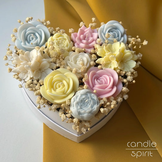 Heart-shaped floral arrangement of pastel flower candles - long-lasting Easter decor
