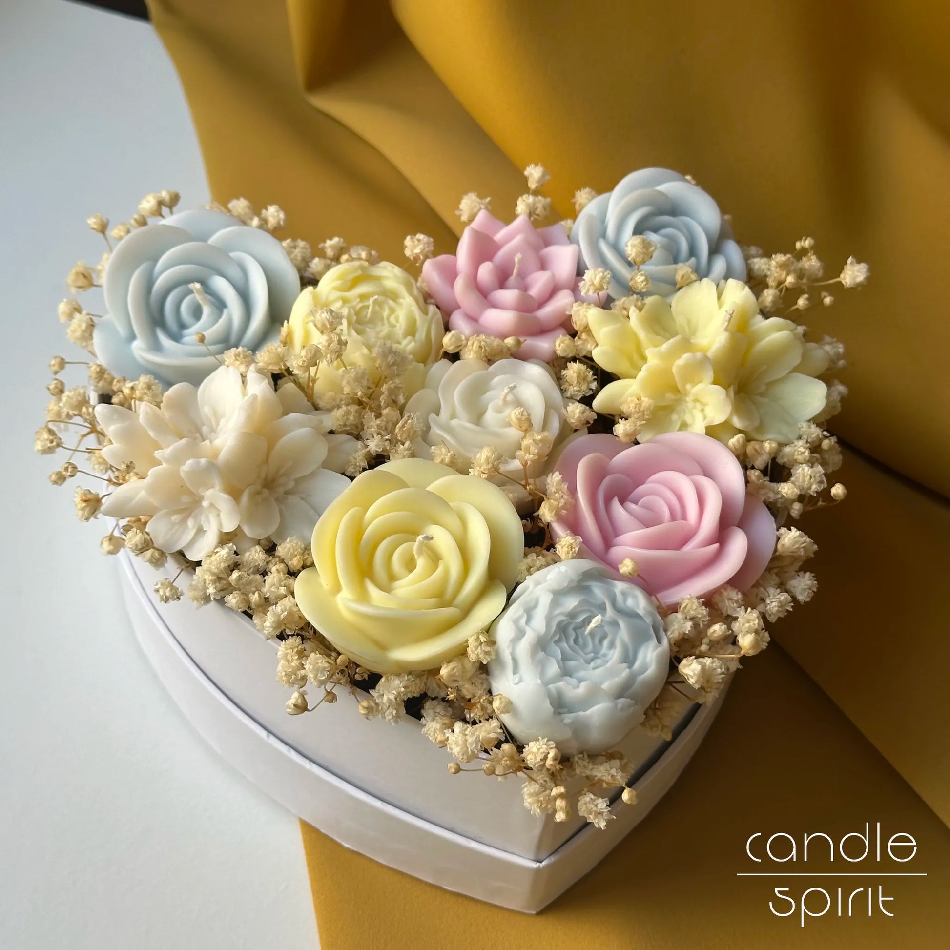 Heart flower box with pastel pink, blue, yellow, and white flower candles - unique Mother's Day gift for a mom