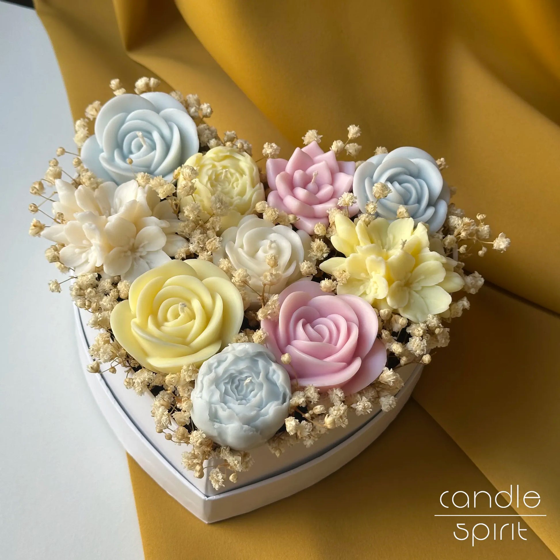 Pastel heart candle bouquet with light blue, pink, yellow, and white flowers and baby's breath - romantic Valentine's gift for a wife, partner, girlfriend