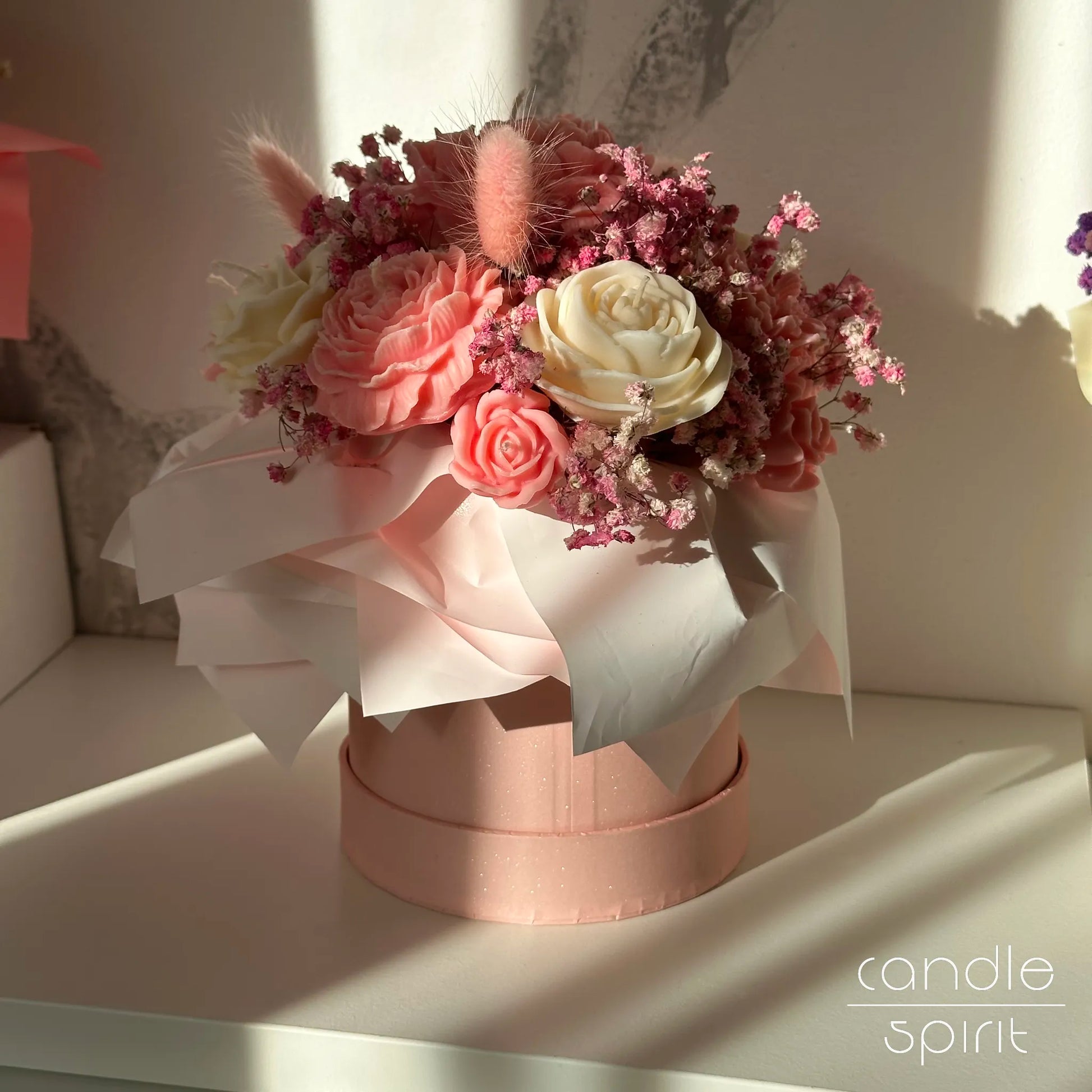Large pink bouquet of flower candles in a pink box - gift for baby showers, pregnancy announcements, and new mothers of baby girls. 