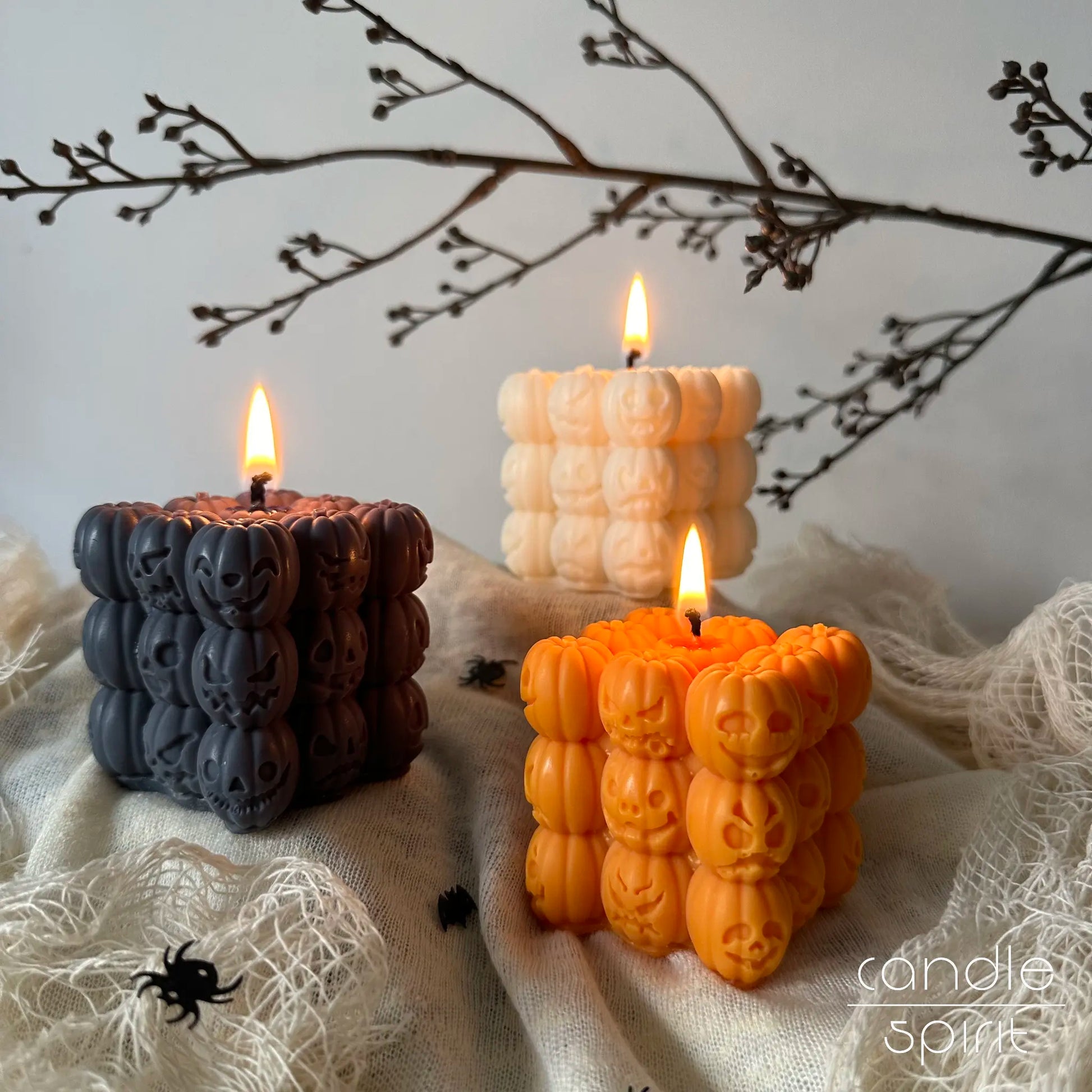 White, gray, and orange pumpkin cube candles - scented Halloween home decor and seasonal gift for best friends, kids, coworkers, and party hosts. 
