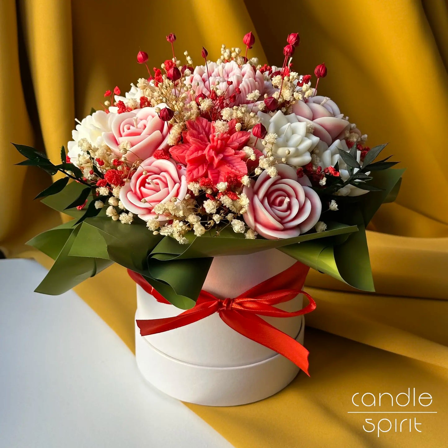 Red and white bouquet of candles with flowers and baby's breath in a white flower box - luxury Mother's Day gift