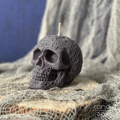 Scented gray celtic skull candle on a Halloween decorations - birthday gift for a boyfriend, husband, and gothic lovers.
