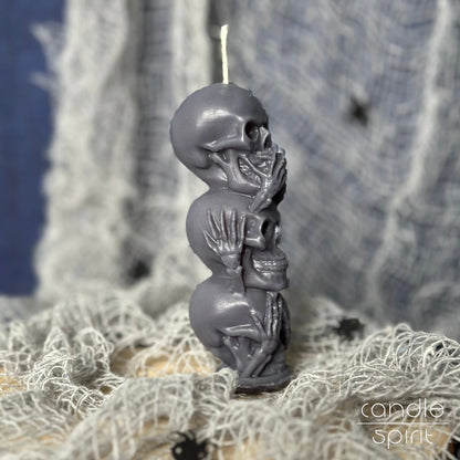 Scented gray skeleton skull candle with Halloween decorations - gothic gift idea