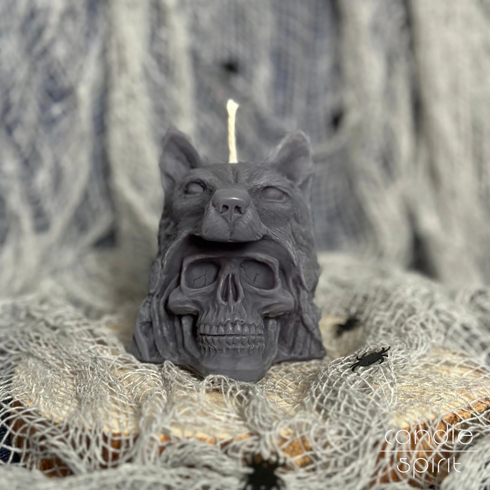 Scented gray human skull candle with a wolf head on gothic decorations - perfect Halloween gift for him