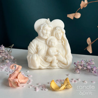 Scented white icon candle of Jesus, Mary, and Joseph - catholic Christmas, Easter, and memorials decor.