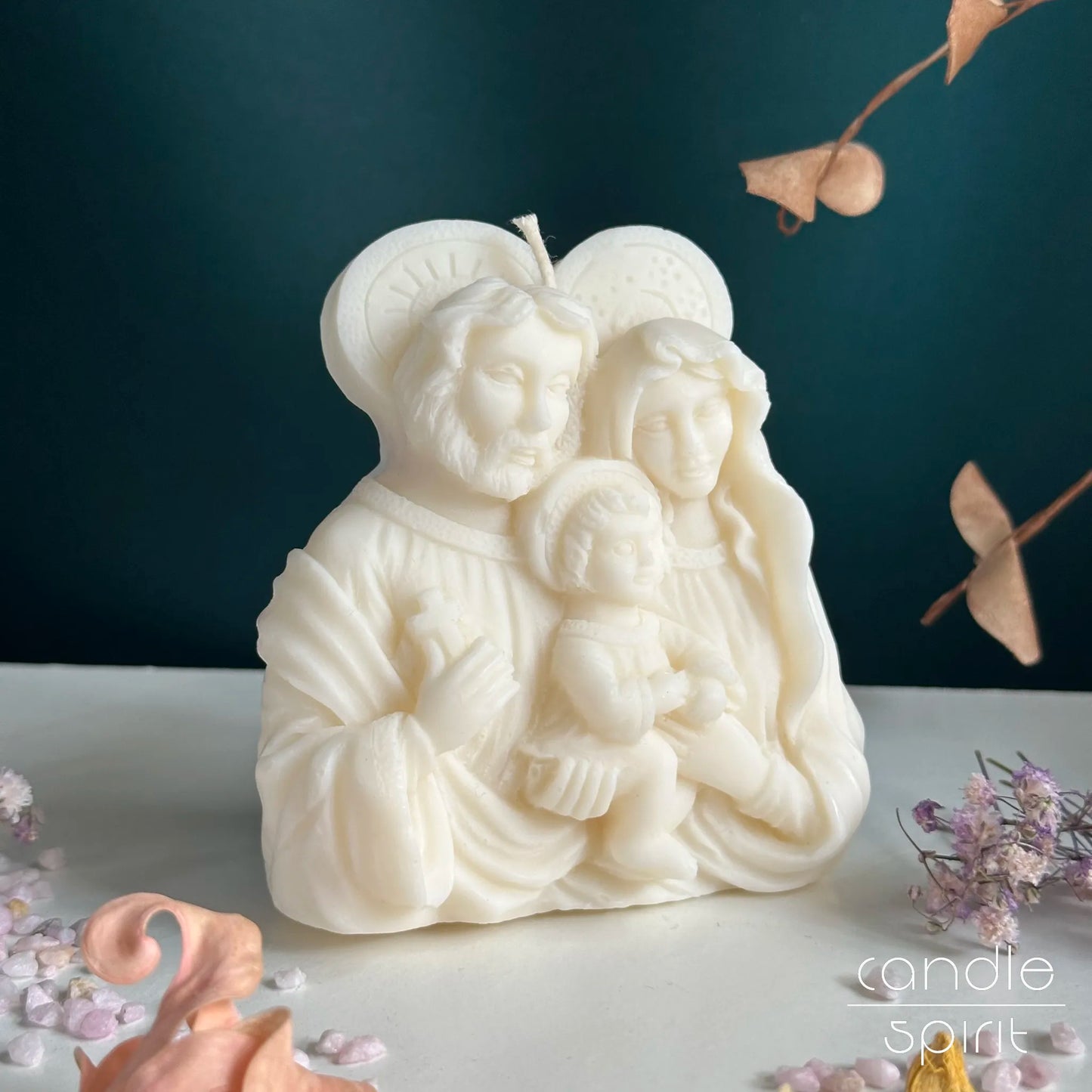 White scented religious candle shaped like Jesus, Mary, and Joseph - unique Catholic gift for baptisms, weddings, confirmations.