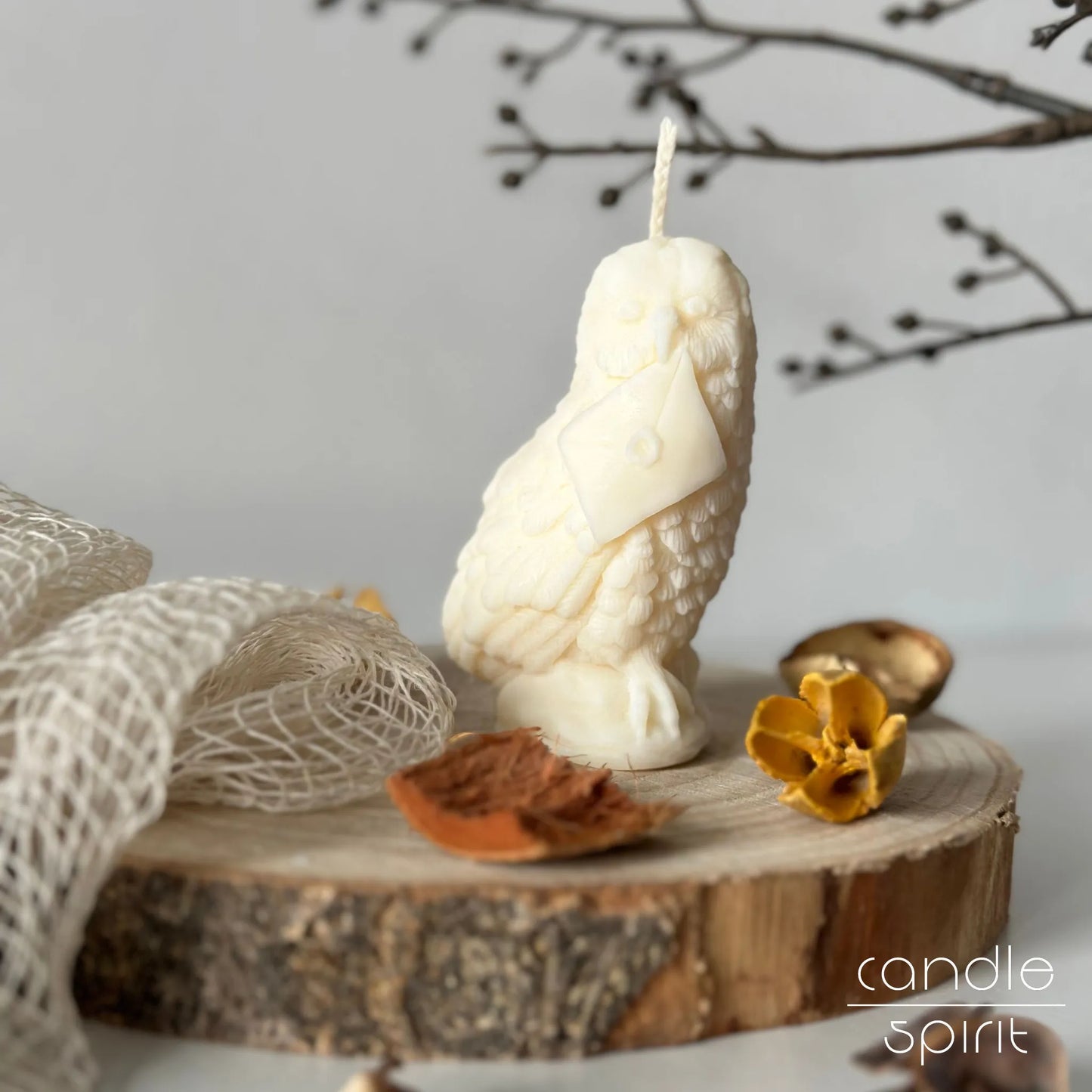 Scented white owl candle - fall home decor and Christmas gift for kids, students, wizards, book lovers, and fantasy fans.