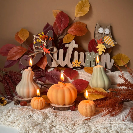 Five scented pumpkin candles in a set - perfect Thanksgiving decor and fall holiday gifts.