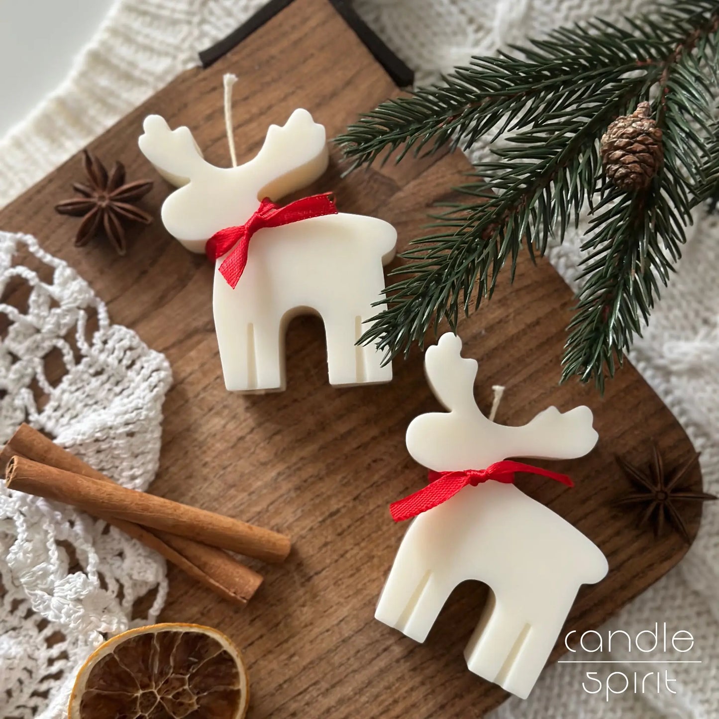 Two white reindeer candles - unique Christmas gift for friends, moms, coworkers, and scented holiday decor.
