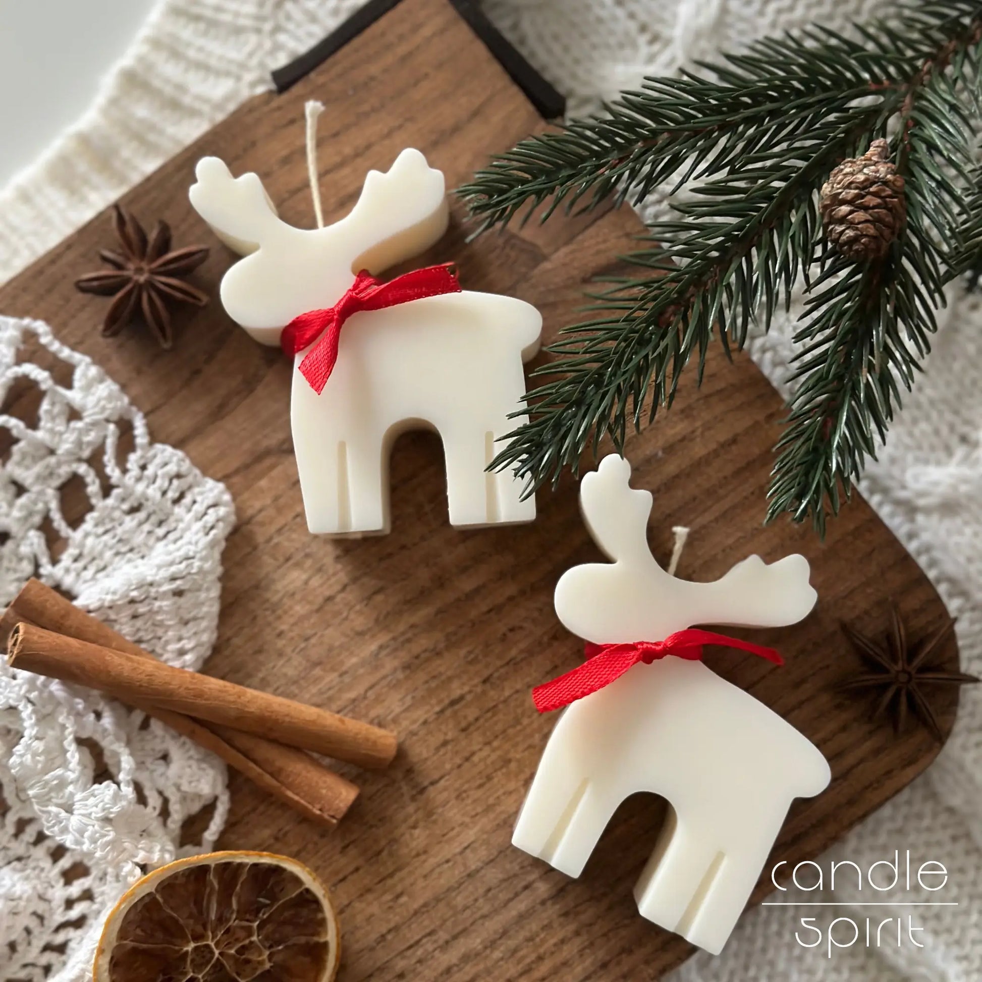 Two white reindeer candles - unique Christmas gift for friends, moms, coworkers, and scented holiday decor.