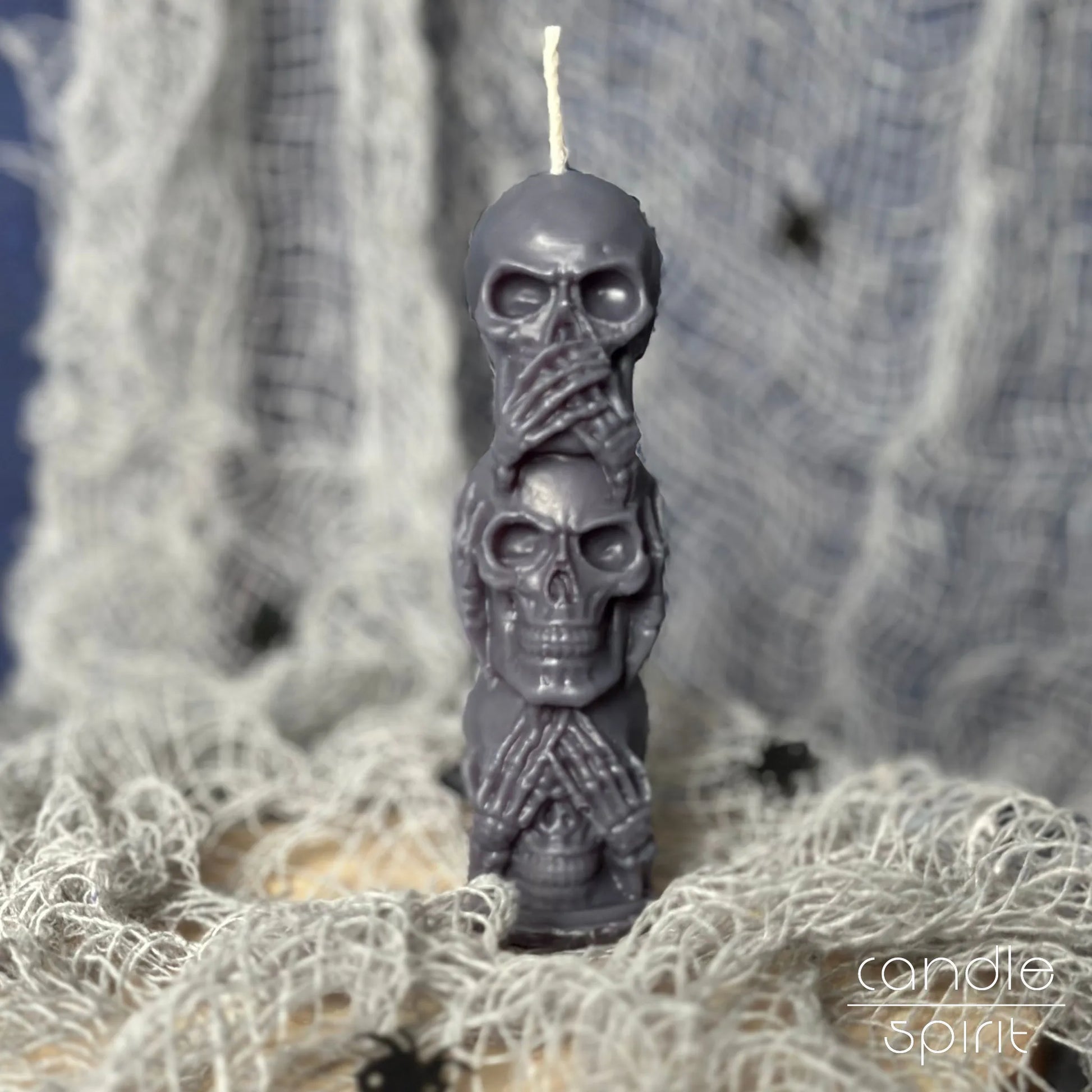 Scented gray Skull-shaped candle - small Halloween gift for alternative home decor lovers