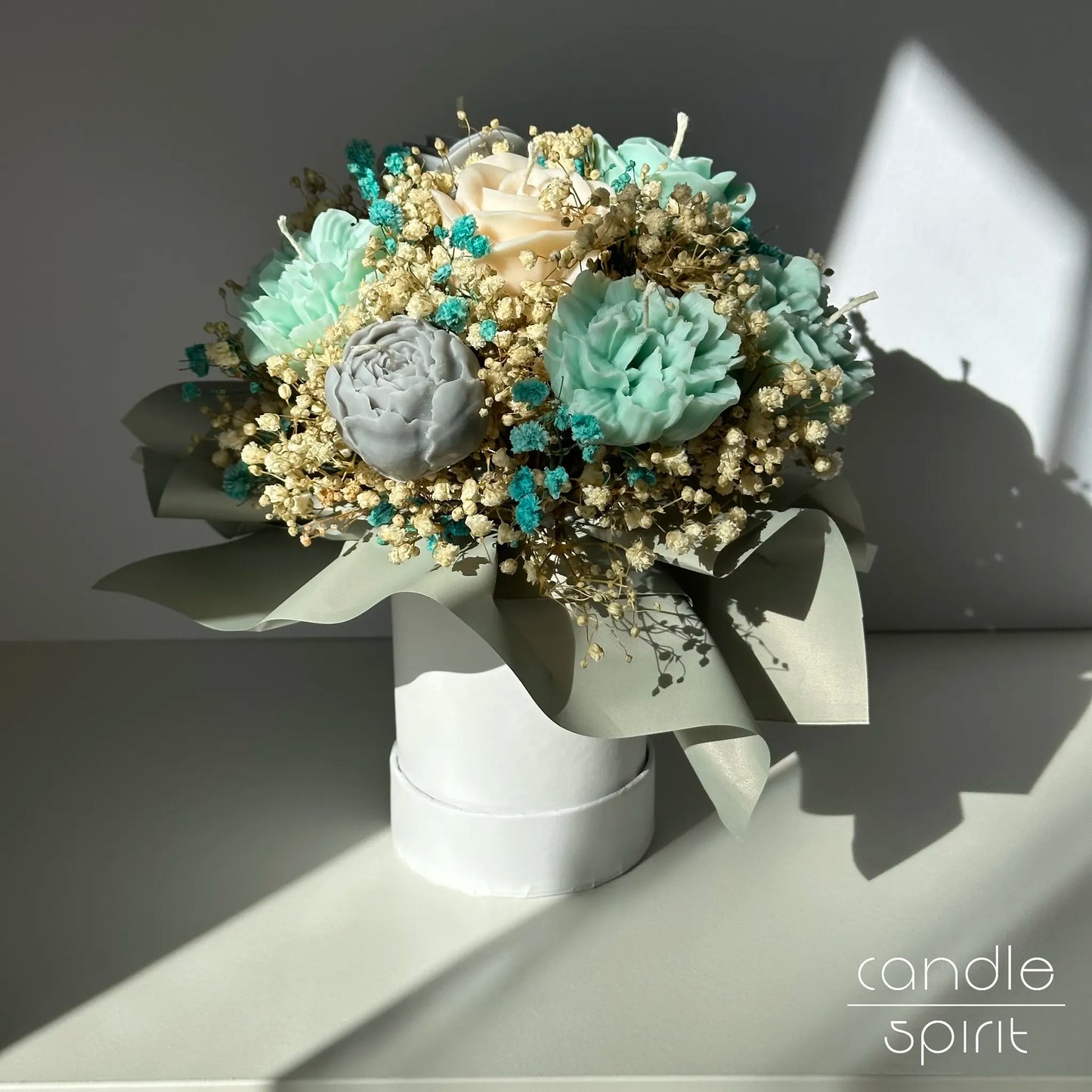 Turquoise, white, and gray flower bouquet of candles - luxury home decor and unique Valentine's Day and Mother's Day gift.