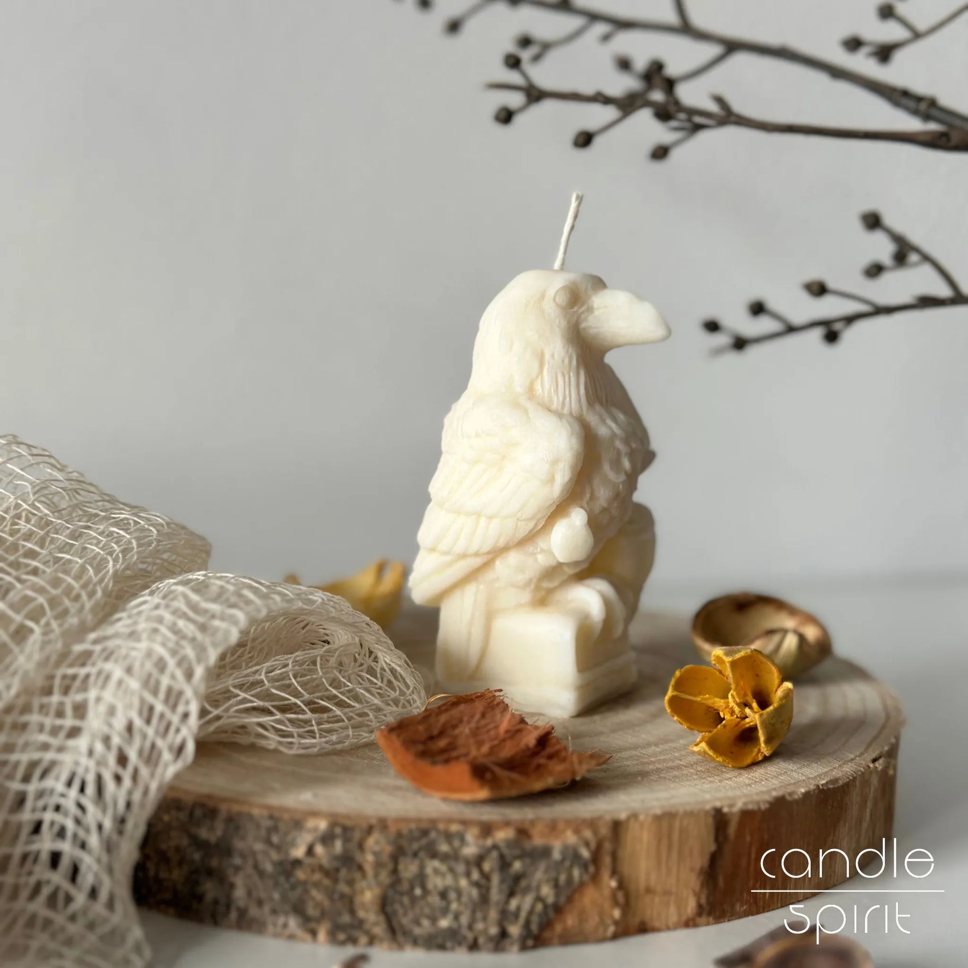 White bird raven candle with autumn decorations - fall candle favors and unique Christmas and Halloween gifts for animal lovers